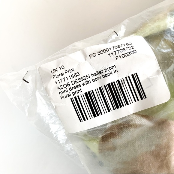 ASOS DESIGN Halter mini dress with bow back in floral print - Picture 10 of 14